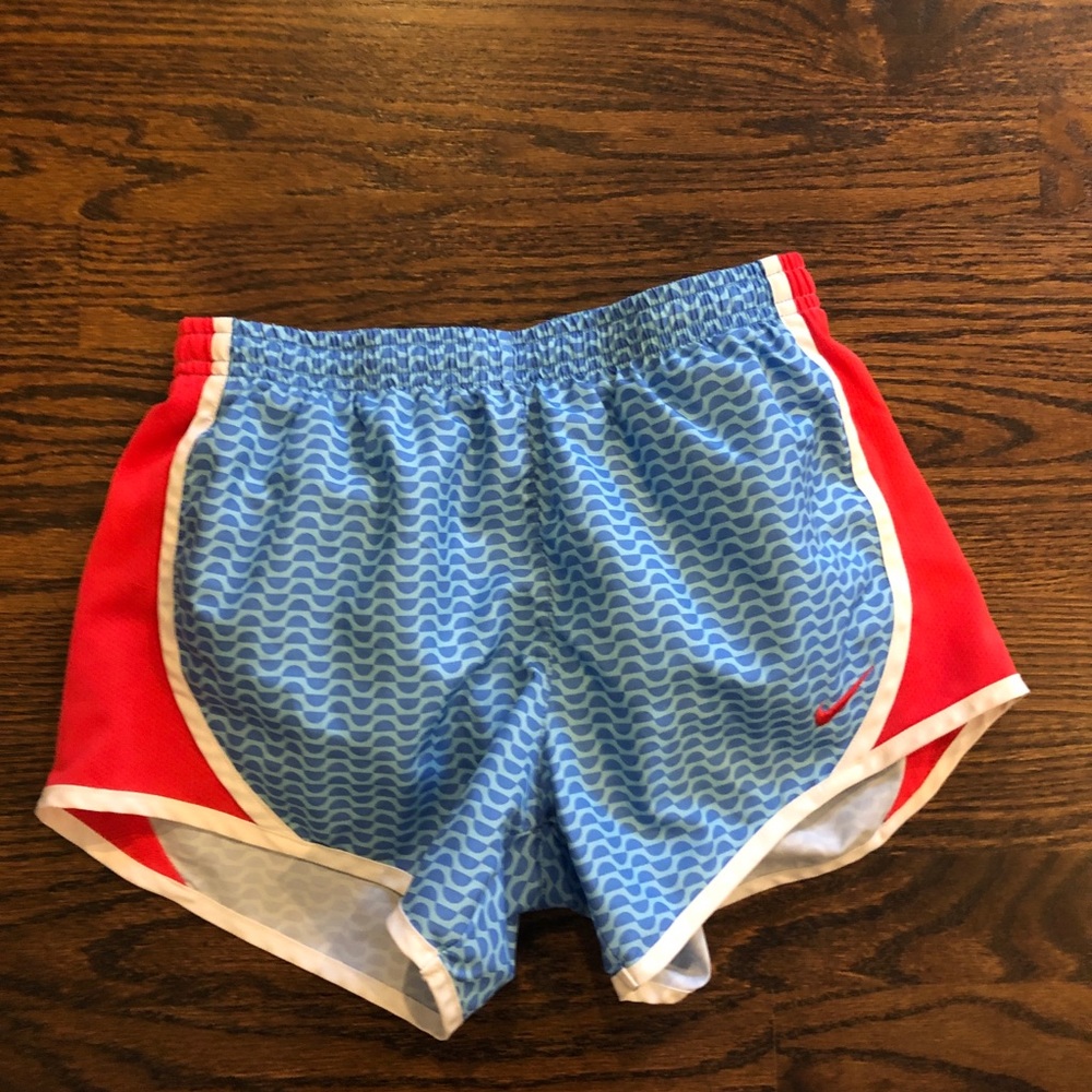 Blue and red nike athletic shorts (size: youth M)